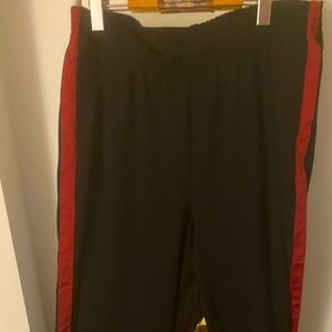 Black pants, red stripe